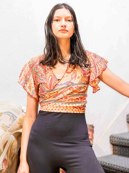 Indie Ella JAZZALYN Tied Flutter Sleeve Silk Wrap Top in Sun Paisley  Indie Ella JAZZALYN Tied Flutter Sleeve Silk Wrap Top in Sun Paisley