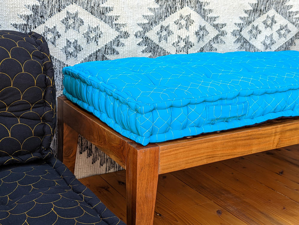 https://cdn11.bigcommerce.com/s-ndgwf6iffo/images/stencil/original/products/2472/11230/indie-ella-double-lark-bohemian-quilted-silk-french-mattress-cushion-in-sky-blue__44410.1661594859.jpg