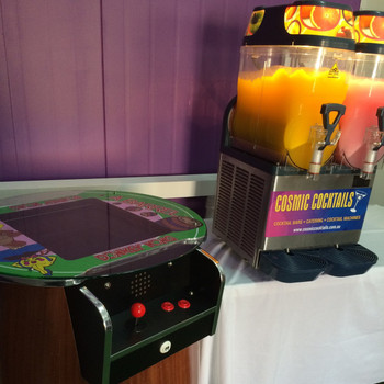 2 Player Arcade Machine with 60 old school games and a 2 Bowl Slushy Machine with 120 drinks