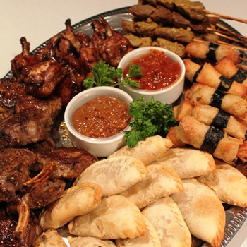 It has Lamb Cutlets (gf), Black Pepper Beef Skewers (gf), Spring Rolls (v), Honey Soy Chicken Wings and Beef Curry Puffs