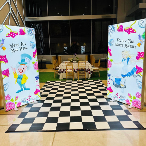 These Alice in Wonderland Checkered Floor Tiles for Hire are the perfect addition to any Alice themed Party, brightening up the room and creating that fun aesthetic.