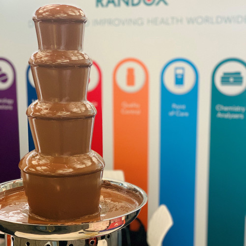 The Supreme Chocolate Fountain Hire Perth Setup is perfect for corporate trade shows and expos to attract guests over to your stand.