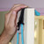 Position the door shoulder pulley strap at the top of the door jamb.