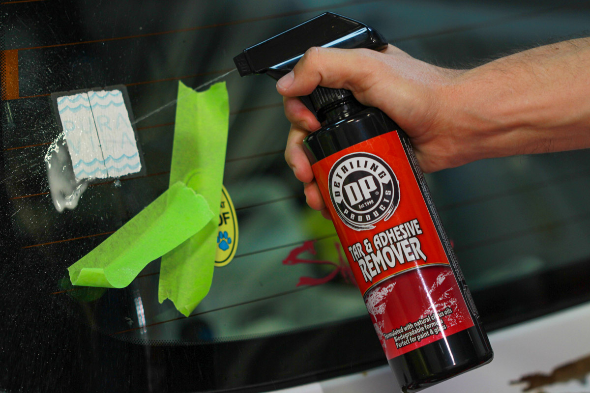 Spray a liberal amount of DP Tar & Adhesive remover directly onto the surface you are working on.