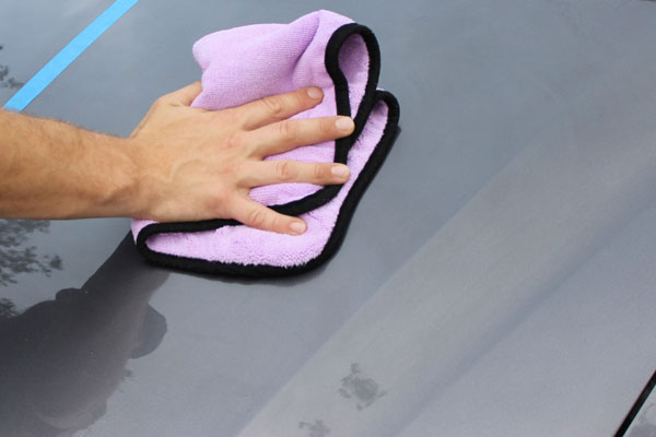 Using a clean microfiber towel, spread DP Need for Bead evenly across the surface.