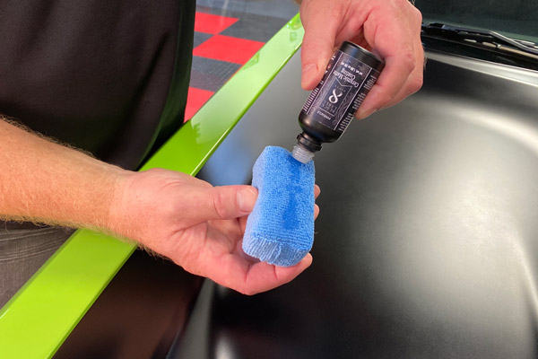 Apply 5-7 drops of Pinnacle Black Label Ceramic Matte Coating onto a microfiber applicator pad.