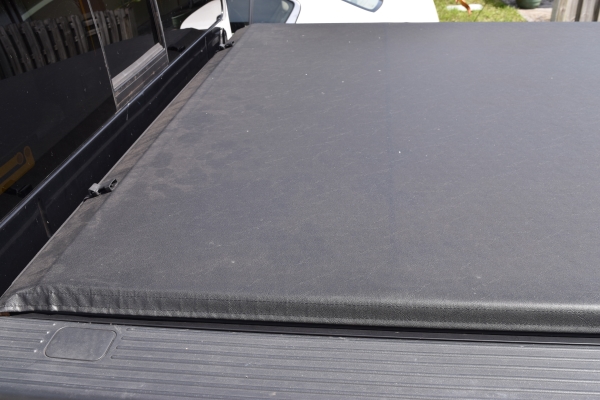 Tonneau cover before restoration with RaggTopp Wolfsteins Tonneau Cover Produts.