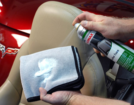 Spray Sonax Leather Foam onto a clean microfiber towel.