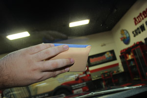 The blue side of the SONAX Windshield Sponge applies a lasting defogger effect