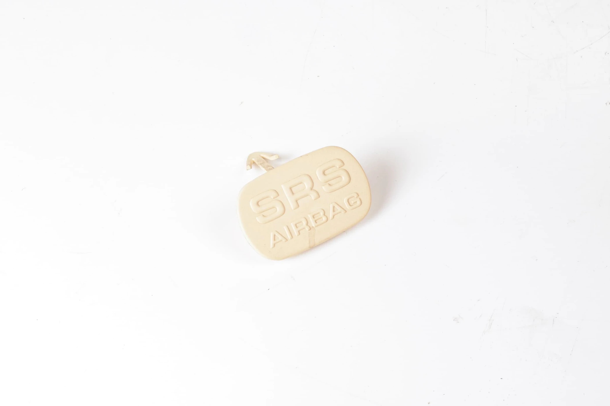 Mercedes 2107271088 SRS Cap Tab - Cream | R129 SL W140 S W168 A C208 A208 CLK...