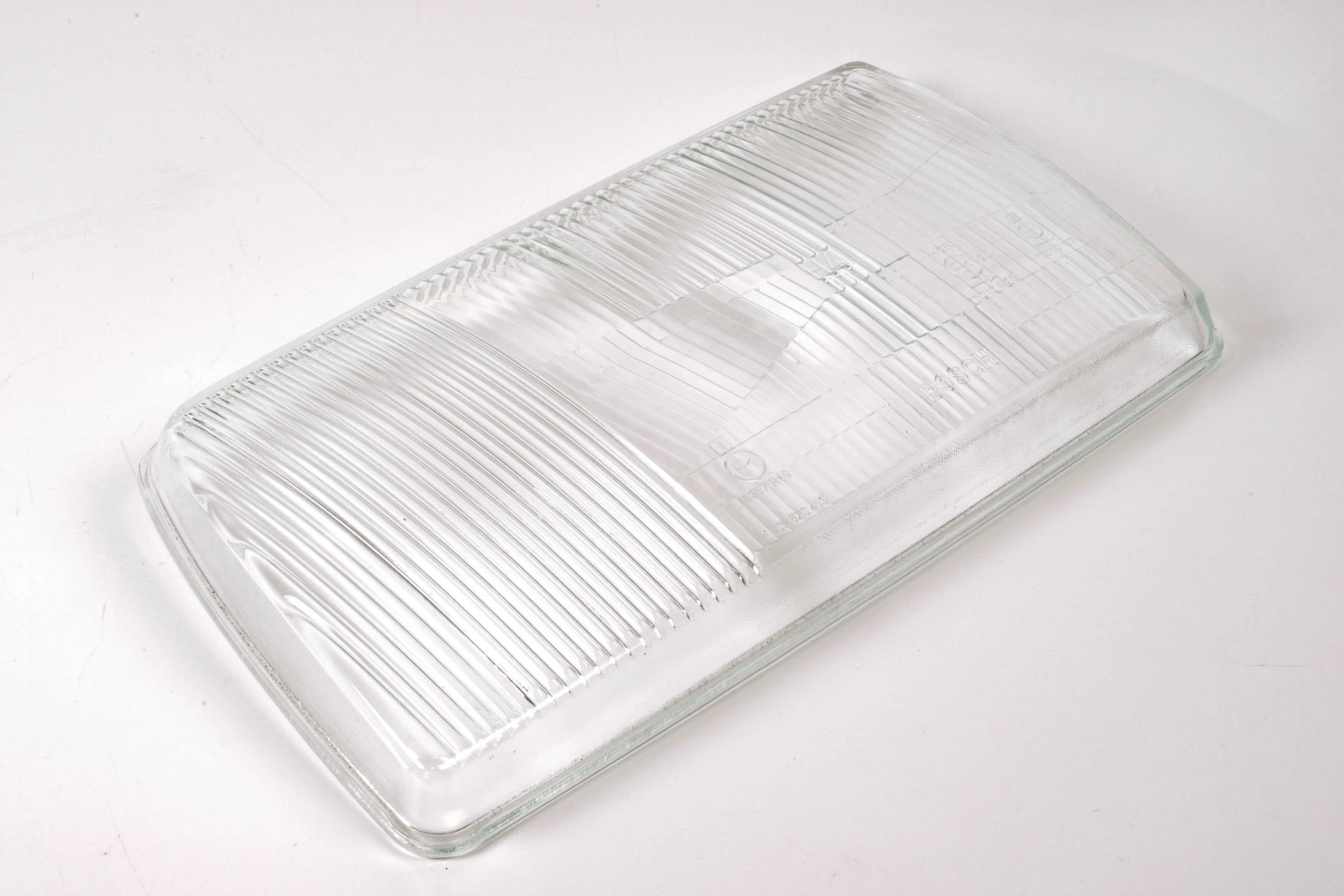 Mercedes 0028265490 Headlight Lens - Left (New Old St.) | W126 V126 S