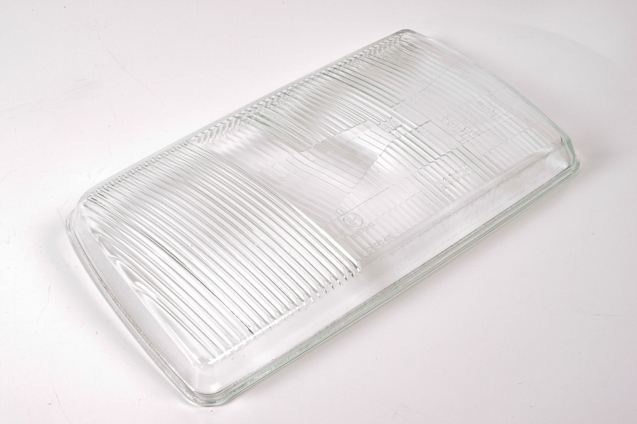 Mercedes 0028265490 Headlight Lens - Left (New Old St.) | W126 V126 S