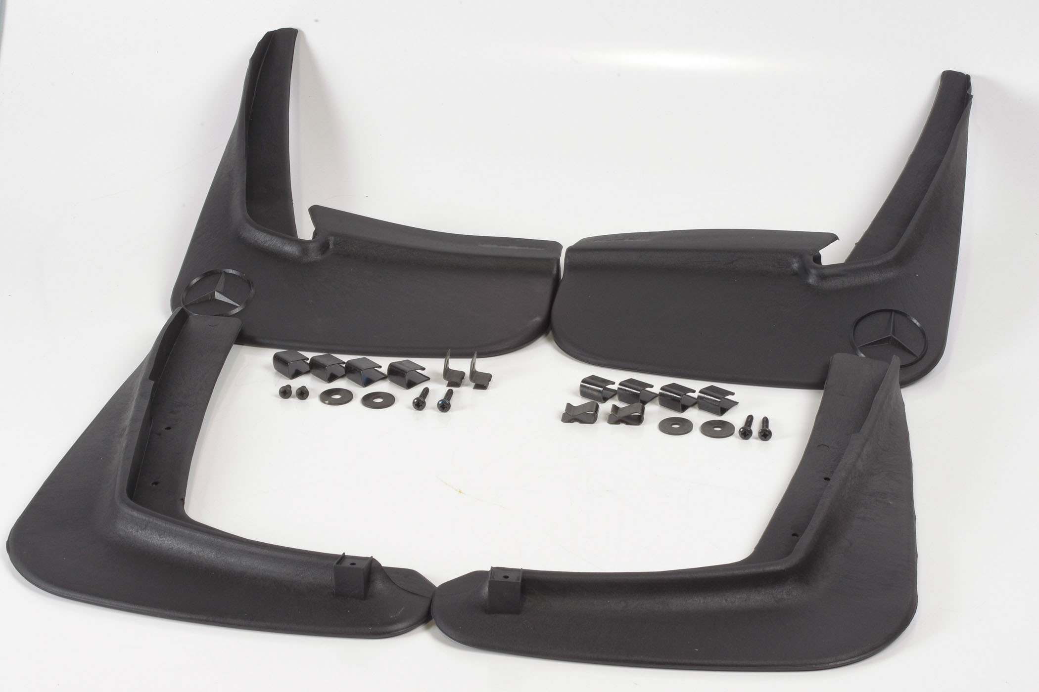 Mercedes 1298840000 Mud Flap Set x4 - Front (New)