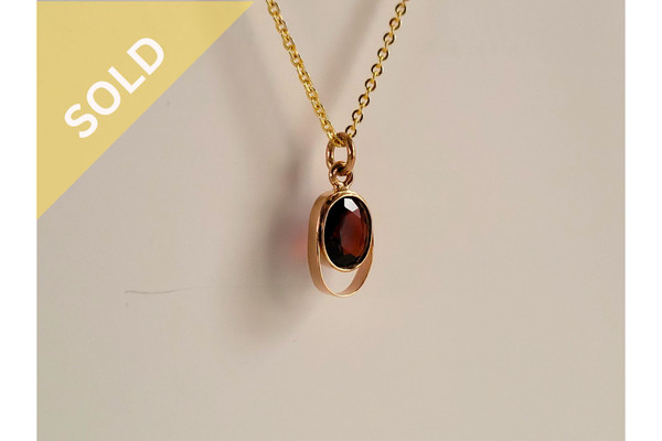 18K Gold Oval Pendant with Red Gemstone