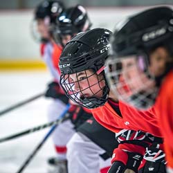 Image of young ringette players on the ice