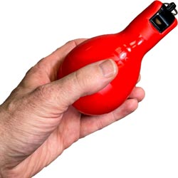 wizzball hand whistle held in hand red