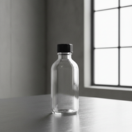 Similar item: 2 oz Clear Glass Boston Round Bottles (Black Phenolic Cap) - 4699B05CLR