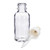 Clear Glass Boston Round Bottles with Dropper Cap beside the bottle