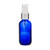 2 oz Cobalt Blue Glass Boston Round Bottles with silver treatment pump and overcap on bottle 2 oz Cobalt Blue Glass Boston Round Bottles with silver treatment pump and overcap on bottle