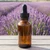 1 oz Amber Glass Boston Round Bottles (Black Dropper Cap) - 4699B33ABRBLK