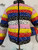 black, blue, red, yellow, pink, white bandana strips made into a puffer jacket