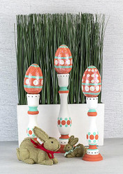 Coral and Blue Easter Eggs on Pedestals