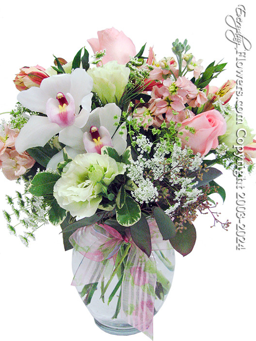 Cymbidium Orchids, Pink Roses, Alstroemeria, Queen Anne's Lace, Stock, & Lisianthus designed in a 8" Glass Vase. Delivery by Everyday Flower Orange County Florist