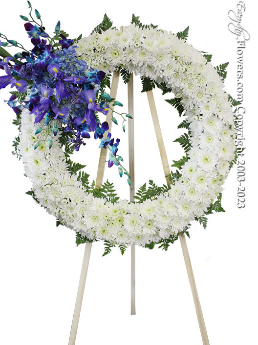 Blue and White Funeral Wreath by Everyday Flowers