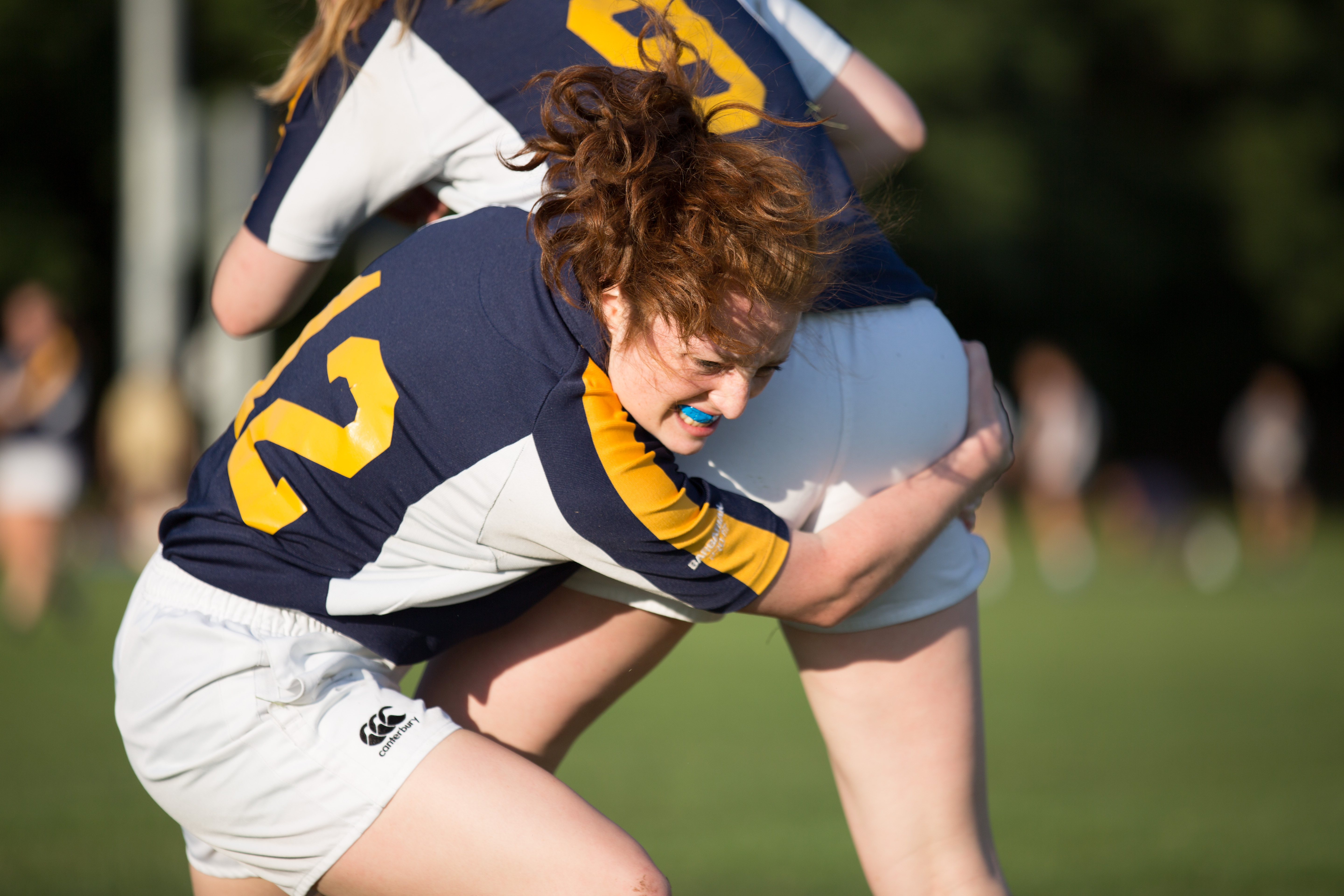 Female athlete with SISU mouthguard
