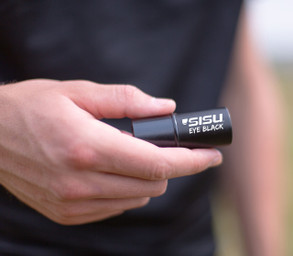 SISU Eye Black held in athlete's hand.