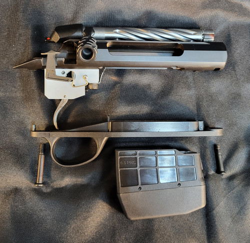 Tikka 6.5 PRC Action.      Magnum Bolt Face