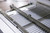 Adjustable rail system for double-sided PCB reflow in the IN6C tabletop oven