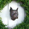 Boxer dog door knocker white door green wreath