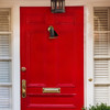 catboat door knocker on red door