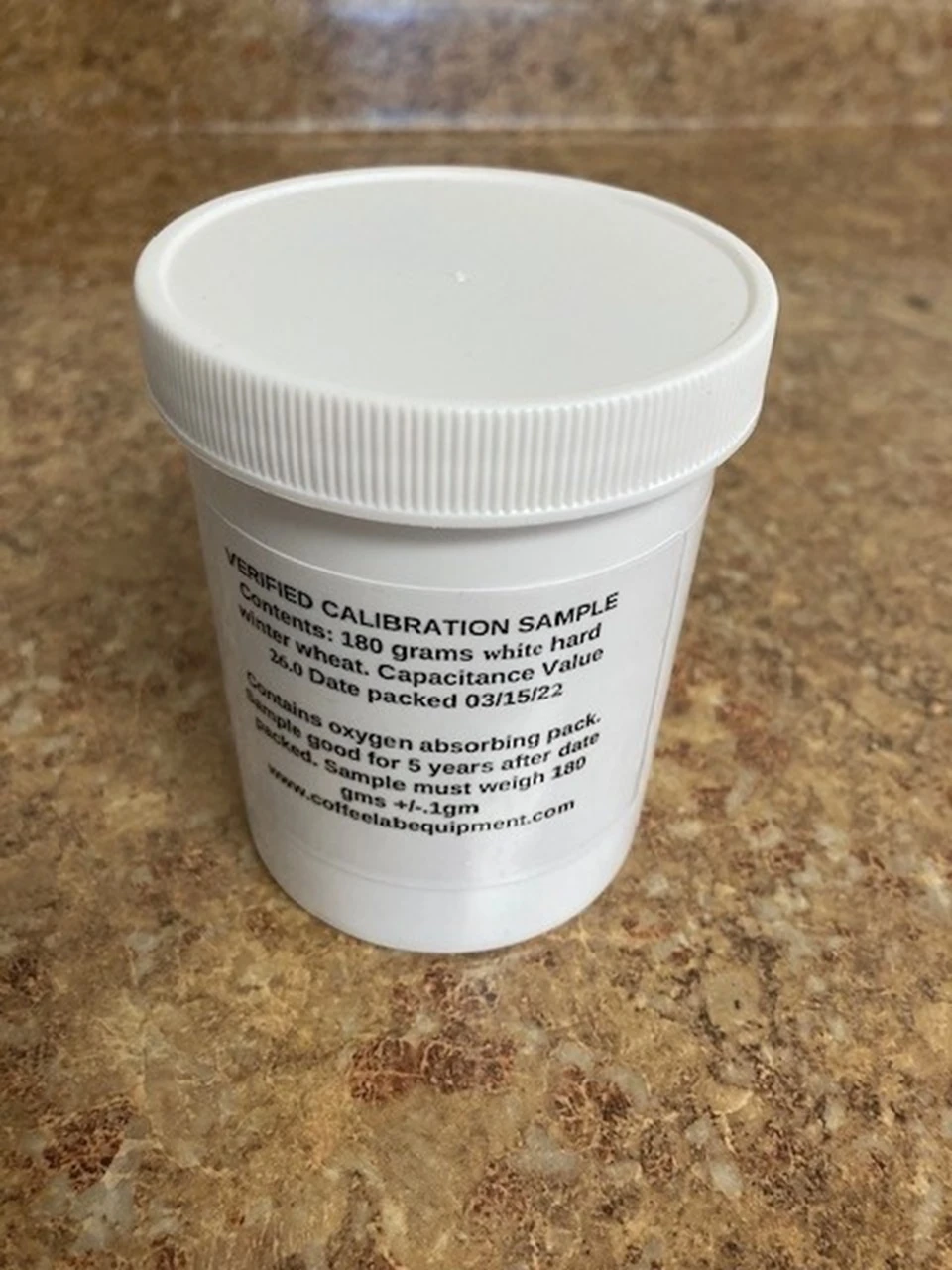 Verified Calibration Sample for Sinar Moisture Analyzers (Cell Type) 
Contents 180 grams hard red winter wheat.
Stored in an air tight container with minimum headspace.
Includes oxygen absorbent packet
