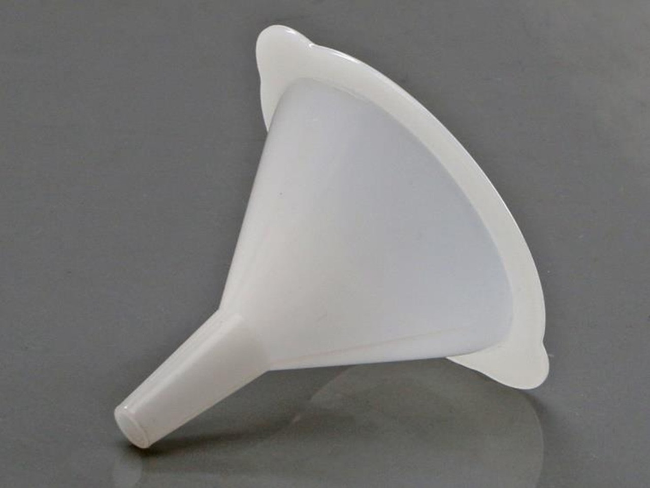 Description: SteriWare Funnel 50mm
Use: Single use, disposable funnel
Material of Construction: High Density Polyethylene (HDPE) - virgin
• Conforms to FDA CFR 177.1520
• Conforms to EU Regulations 10/2011
• Conforms to EC Regulations 1935/2004
• BSE/TSE free
Method of Construction: Single piece, injection moulded
Max. Diameter: 68mm
ID at Top of Funnel: 50mm
Overall Height: 56mm
OD at Bottom of Spout: 8mm
ID at Bottom of Spout: 5mm
OD at Top of Spout: 12mm
Nominal Weight: 6g
Moulding Environment: Class 100,000 Cleanroom
Primary Packing Environment: Class 10,000 Cleanroom
Individually Bagged? Yes (heat sealed PE/PET bag)
Method of Sterilisation: N/A
Quantity per Box: 100
Recommended Storage Conditions: Dry and ambient temperature
Shelf Life: 5 years from the date of manufacture
ATEX: This device has not been ATEX tested