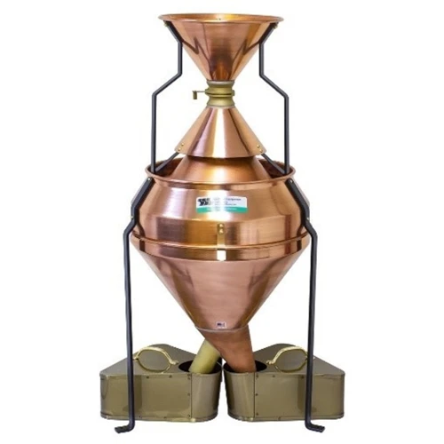 Around the base of the cone are 38 openings or pockets. 
The grain falling down the sides of the cone is cut into 38 separate streams, 
rejoining into two streams, which empties into the two pans.