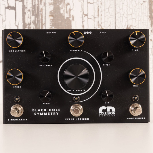 Collision Devices Black Hole Symmetry