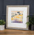 Framed landscape picture on table with pot plants.