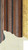 Walnut coloured tradition picture frame moulding with a gold edge/