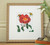 Poppy art print framed in a slim vintage ornate gold frame