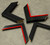 4 Carbon fibre effect picture frame samples on concrete floor.