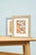 2 Framed prints on a table - Morris moulding range