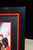 Corner close up of carbon fibre effect frame with red inner edge