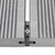 Close up of T Clips fixings between 2 composite decking boards.