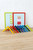 2 Lollipop prints in bright coloured frames with corner samples on floor