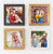 Group of 4 small photo frames on a wall.