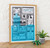 Modern art print framed in Polcore oak effect, displayed on a table with a decorative plant.
