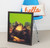 Modern Mona Lisa painting in ornate ebony frame