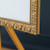 corner of ornate gold frame